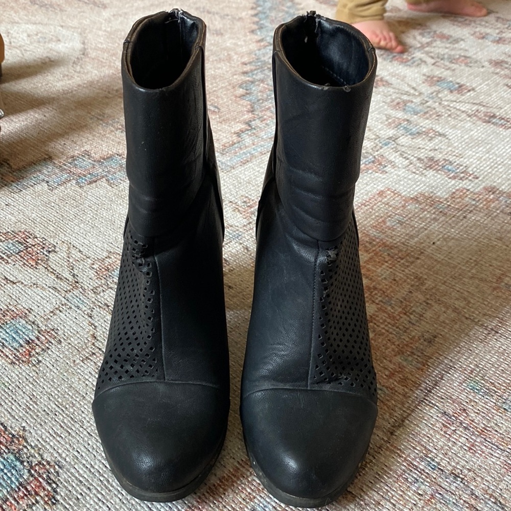 Zippered 3/4 length black booties. 2.5 inch heels.